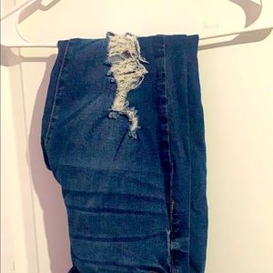 Distressed blue jeans